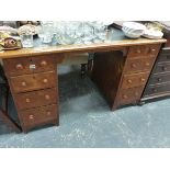 A VICTORIAN ASH PEDESTAL DESK.