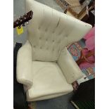 A RETRO SWIVEL ARMCHAIR.