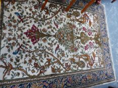 A SMALL PERSIAN PATTERN RUG.