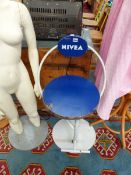 A VINTAGE NIVEA STOOL.