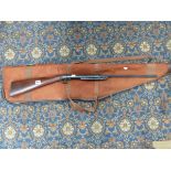 A VINTAGE AIR RIFLE.