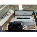 A CASED PARKER PEN TOGETHER WITH TWO SHEAFFER PENS AND TWO HARMONICAS.