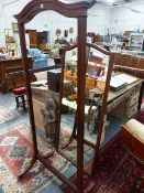 A MAHOGANY AND INLAID CHEVAL MIRROR LABELLED FOR HOWARD & SONS, LONDON