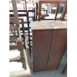 A SMALL LATE 19th.C.OAK CABINET WITH PANELLED DOORS.