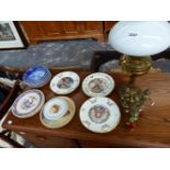 AN OIL LAMP AND A COLLECTION OF VARIOUS CHRISTMAS PLATES TO INCLUDE DOULTON AND COPENHAGEN.