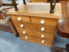 A VICTORIAN PINE CHEST OF DRAWERS.