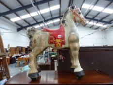 A VINTAGE TINPLATE MOBO HORSE.
