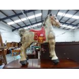 A VINTAGE TINPLATE MOBO HORSE.