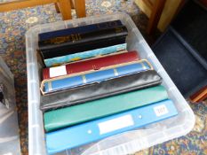 A QUANTITY OF STAMP FOLIOS AND ALBUMS.