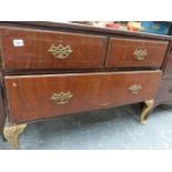 AN 18th.C.WALNUT CHEST OF TWO SHORT AND ONE LONG DRAWER ON GILT CABRIOLE LEGS.