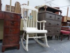 AN ANTIQUE AMERICAN STYLE ROCKING CHAIR WITH SHAPED SEAT.