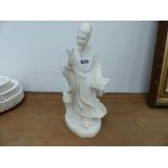 AN ORIENTAL ALABASTER FIGURE.