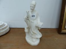 AN ORIENTAL ALABASTER FIGURE.