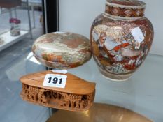 TWO SATSUMA WARE COVERED VESSELS TOGETHER WITH FAR EASTERN CARVING.