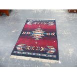 A SMALL RUG.
