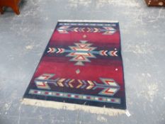 A SMALL RUG.