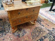 A GEORGIAN WALNUT SMALL CHEST OF DRAWERS.