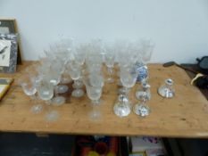 A SET OF FOUR AMERICAN STERLING SILVER CANDLESTICKS AND VARIOUS CUT GLASSWARE.