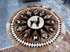 A LARGE SOUTH AMERICAN WOOL RUG.