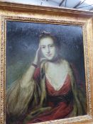 A LARGE GILT FRAMED PORTRAIT STUDY.