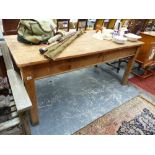 AN ANTIQUE PINE KITCHEN TABLE.