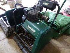 A QUALCAST CLASSIC 35S MOWER AND SCARIFIER.