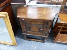 A SMALL OAK SIDE CABINET, AN OAK COFFEE TABLE AND A SMALL MODERN SIDEBOARD.