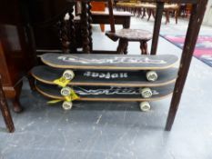 THREE SKATEBOARDS.