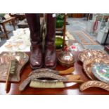 FOUR ART NOUVEAU CRUMB TRAY AND BRUSH SETS, A COPPER LIDDED VESSEL AND A PAIR OF RIDING BOOTS.