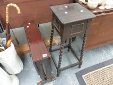 AN EDWARDIAN MAHOGANY SUTHERLAND TABLE AND AN OAK PLANTSTAND.