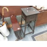 AN EDWARDIAN MAHOGANY SUTHERLAND TABLE AND AN OAK PLANTSTAND.