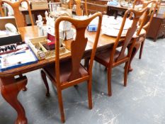 AN EARLY 20th.C.MAHOGANY WIND OUT DINING TABLE AND FIVE SIMILAR DINING CHAIRS.