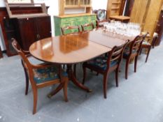 A REGENCY STYLE DINING TABLE AND SIX DINING CHAIRS.