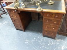 A VICTORIAN ASH PEDESTAL DESK.