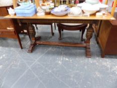 AN OAK JACOBEAN STYLE SMALL REFECTORY TABLE.