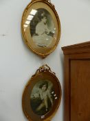 A PAIR OF GILT FRAMED PRINTS.