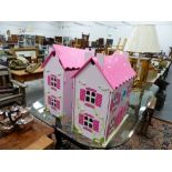 TWO DOLLS HOUSES.