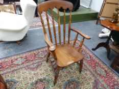 A VICTORIAN BEECH AND ELM KITCHEN ARMCHAIR