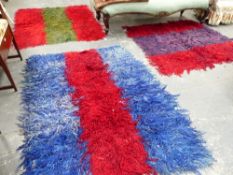 THREE MID CENTURY LONG PILE RUGS.