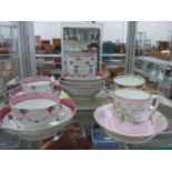 RUSSIAN COFFEE CAN AND SAUCER TOGETHER WITH ENGLISH FAMILLE ROSE STYLE TEA BOWLS AND SAUCERS.