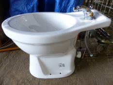 AN UNUSED BIDET.