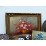 A LARGE GILT FRAMED OIL ON CANVAS STILL LIFE OF FLOWERS.