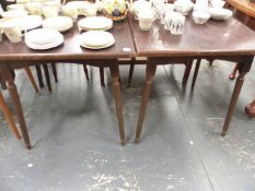 A PAIR OF OCCASIONAL TABLES ON REEDED LEGS.