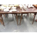 A PAIR OF OCCASIONAL TABLES ON REEDED LEGS.