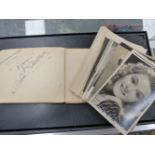 AN AUTOGRAPH ALBUM TOGETHER WITH VARIOUS SIGNED PHOTOGRAPHS, ETC.