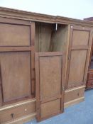 A LARGE PINE LINEN PRESS.