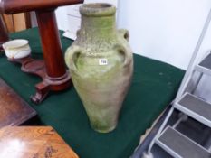 A LARGE POTTERY OIL JAR.