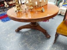 A LARGE EARLY 19th.C.MAHOGANY BREAKFAST TABLE WITH CARVED PAW FEET.