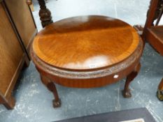 A LARGE MAHOGANY COFFEE TABLE.