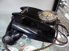 A VINTAGE WALL MOUNTED TELEPHONE.